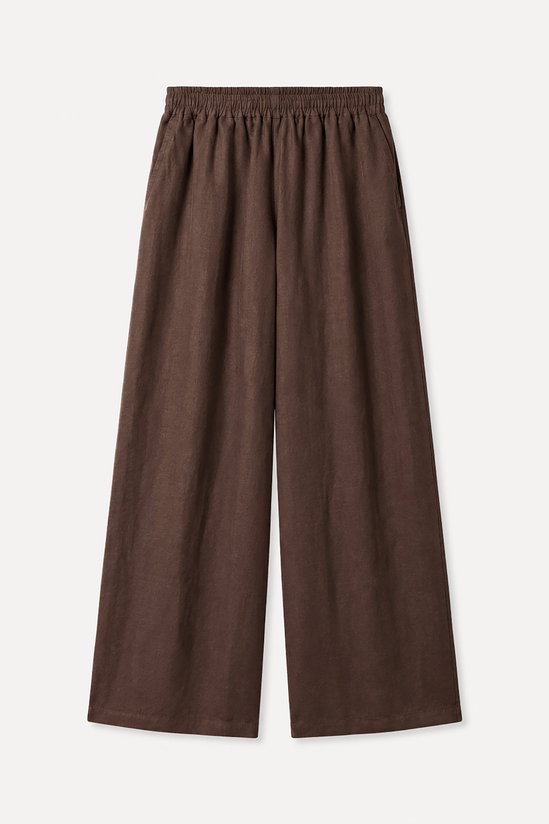 Brown wide-leg pants on a light beige background
