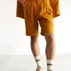 pleated linen shorts saffron