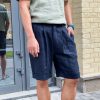 linen shorts with pleats