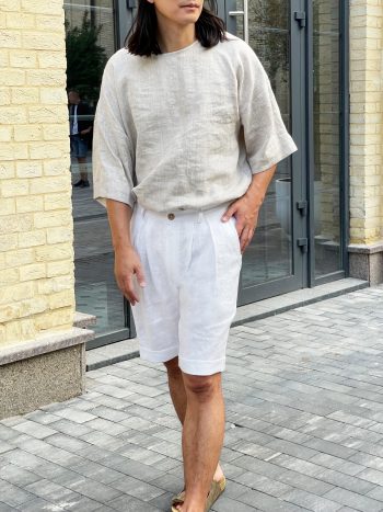 white linen shorts with pleats